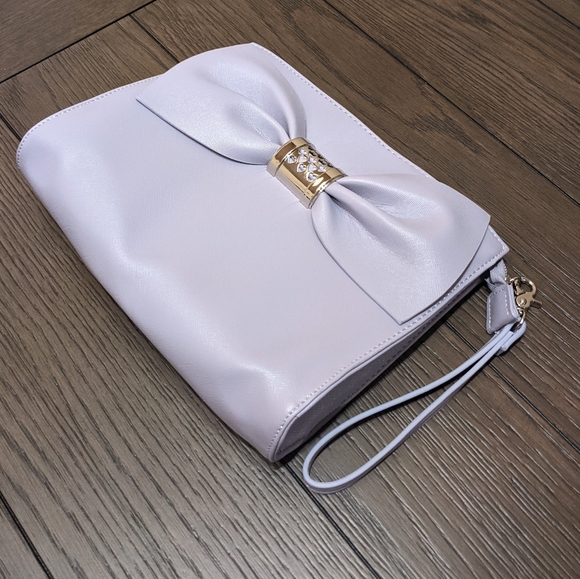 Betsey Johnson Handbags - Betsy Johnson Lavender Clutch